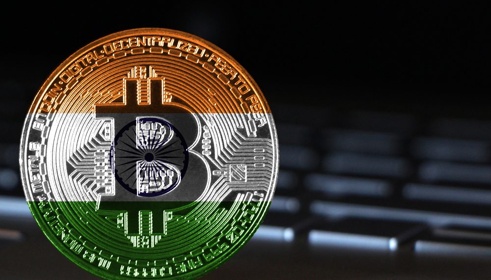 Multicolored Bitcoin coin in the Indian national colors, prominently displayed with intricate designs, symbolizing the surge in cryptocurrency popularity and investment in India and around the world