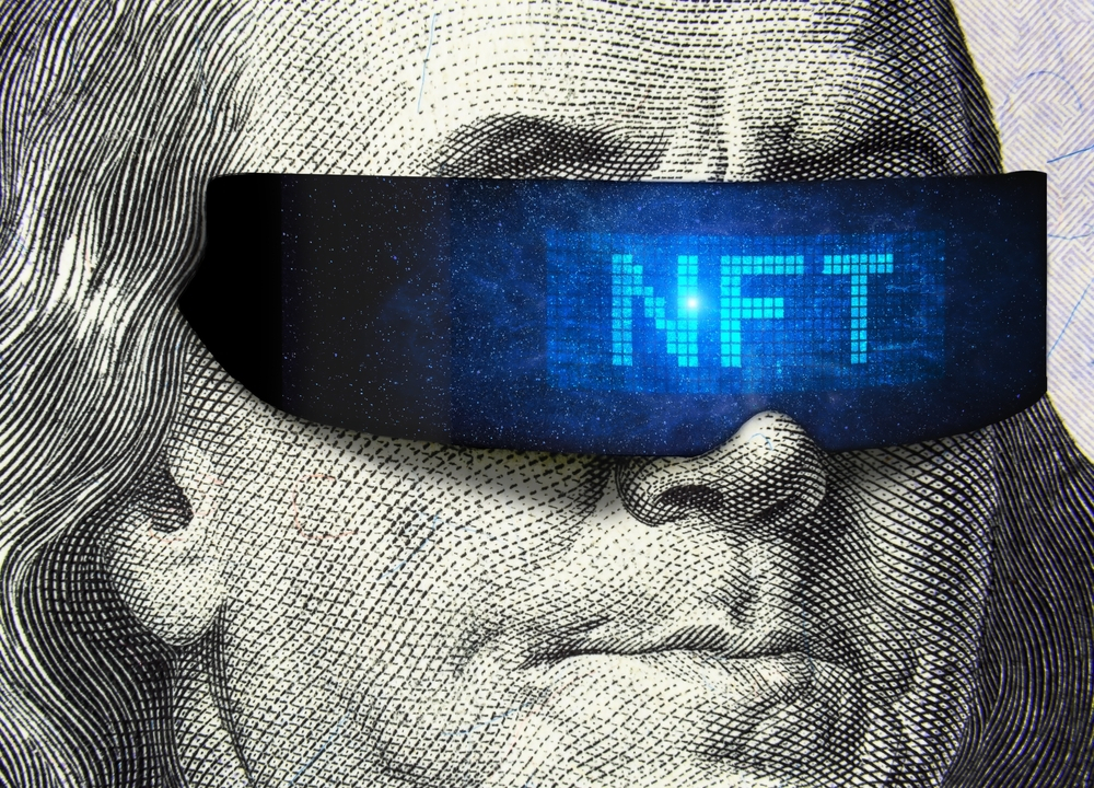 The image presents a striking and creative juxtaposition of classic and digital art forms. It shows a highly detailed portion of a US hundred-dollar bill, focusing on the portrait of Benjamin Franklin. A significant modern twist is added with a digital blindfold covering Franklin's eyes, emblazoned with the bright blue letters 